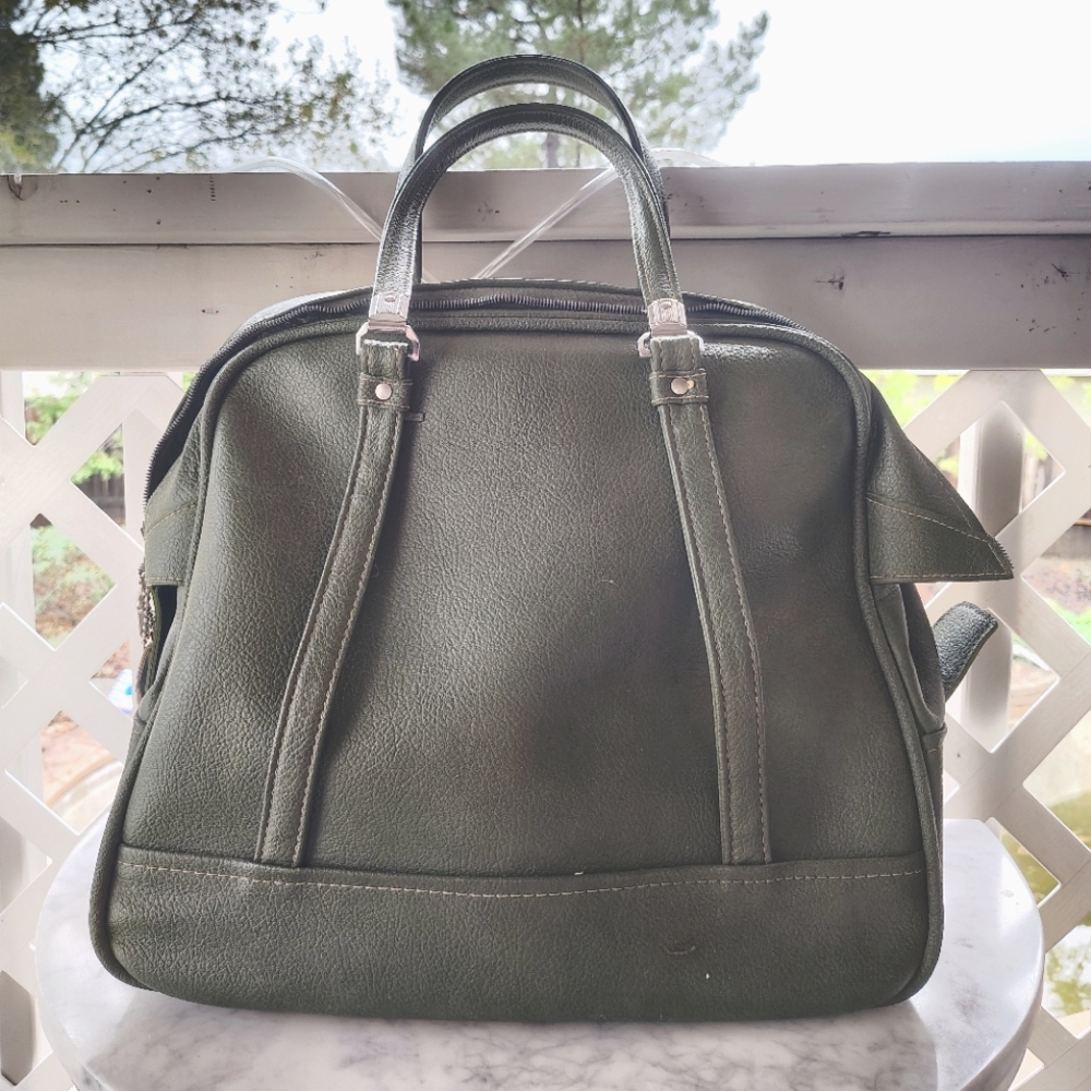 Military Green Bowling Ball Style Overnight Bag by American Tourister